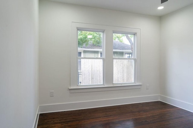 1020 E 16th St, Houston, TX 77009 - unfurnished room with dark wood-type flooring and recessed lighting
