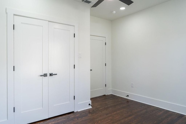 1020 E 16th St, Houston, TX 77009 - unfurnished bedroom featuring dark wood-style flooring, recessed lighting, a closet, and a ceiling fan