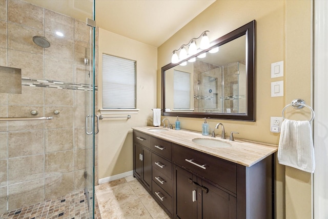 10050 Locke Ln, Houston, TX 77042 - bathroom with double vanity, a stall shower, and tile patterned floors