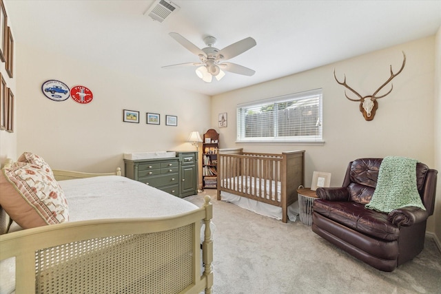 10050 Locke Ln, Houston, TX 77042 - bedroom with light carpet and a ceiling fan