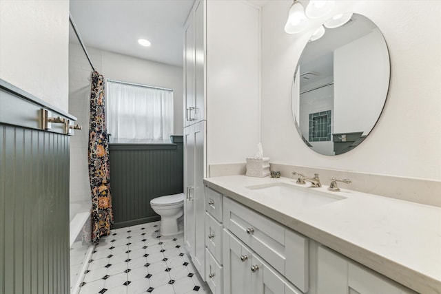 10050 Locke Ln, Houston, TX 77042 - bathroom with vanity, shower / bath combo with shower curtain, and tile patterned floors