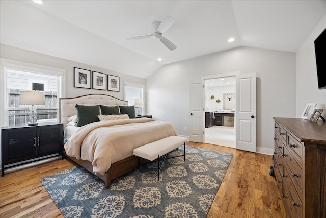 1247 Martin St, Houston, TX 77018 - bedroom featuring lofted ceiling, light wood finished floors, recessed lighting, multiple windows, and connected bathroom