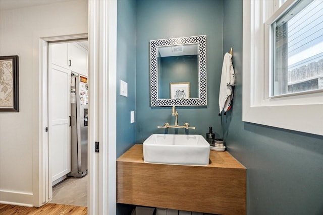 1247 Martin St, Houston, TX 77018 - bathroom with vanity and wood finished floors