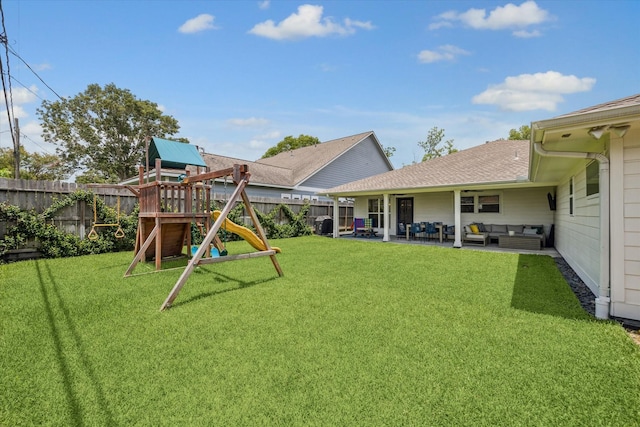 1247 Martin St, Houston, TX 77018 - fenced backyard featuring an outdoor hangout area, a playground, and a patio
