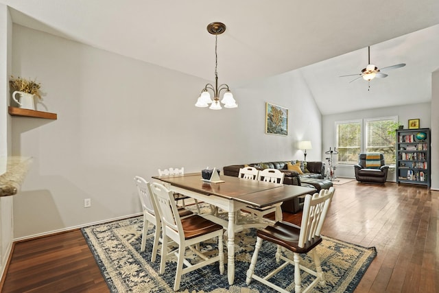 2911 Clay St, Houston, TX 77003 - dining area featuring dark wood finished floors, lofted ceiling, ceiling fan, and a chandelier