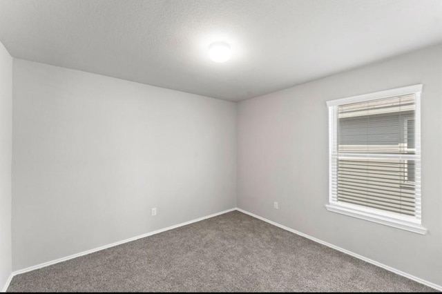 23322 Pelham Prairie Ln, Spring, TX 77373 - carpeted empty room featuring baseboards