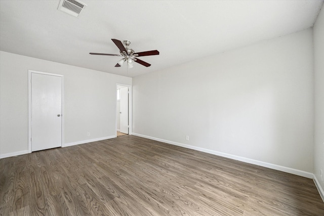 11331 Woollcott St, San Antonio, TX 78251 - unfurnished room with wood finished floors and ceiling fan