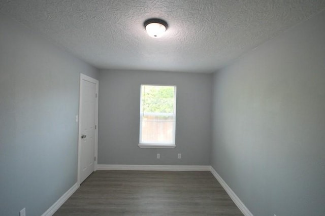 3007 Tuam St, Houston, TX 77004 - empty room featuring a textured ceiling and wood finished floors