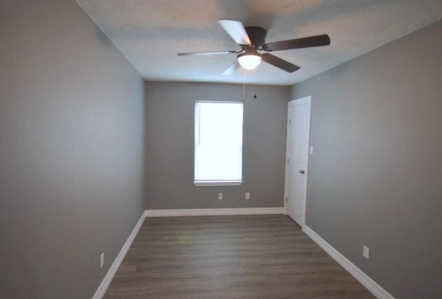 3007 Tuam St, Houston, TX 77004 - unfurnished room with ceiling fan, wood finished floors, and a textured ceiling
