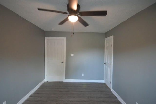 3007 Tuam St, Houston, TX 77004 - spare room with a ceiling fan and dark wood-type flooring