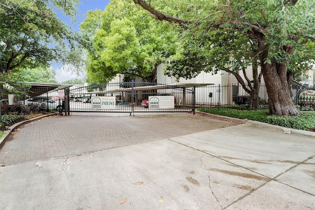 1100 Augusta Dr Unit 63, Houston, TX 77057 - view of front of home featuring a gate and driveway