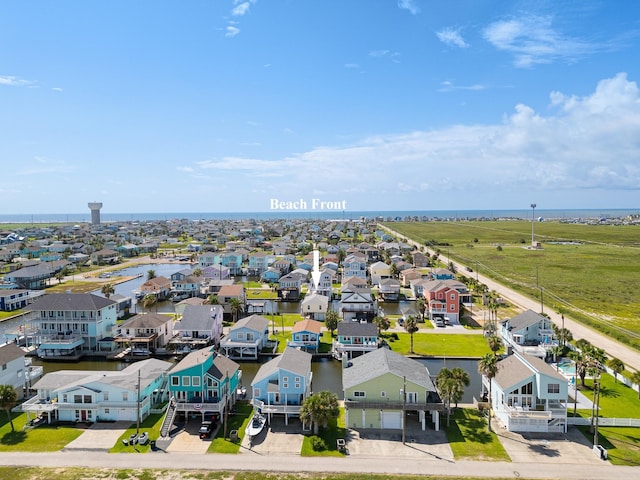 16711 Kingston Way, Galveston, TX 77554 - aerial view of residential area featuring a nearby body of water