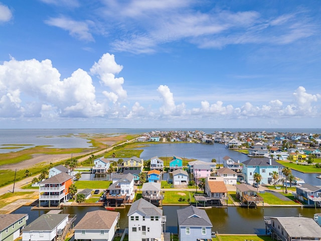16711 Kingston Way, Galveston, TX 77554 - aerial perspective of suburban area featuring a nearby body of water