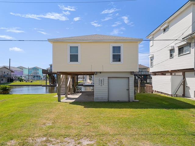 16711 Kingston Way, Galveston, TX 77554 - rear view of house featuring stairs, a water view, a lawn, and a carport