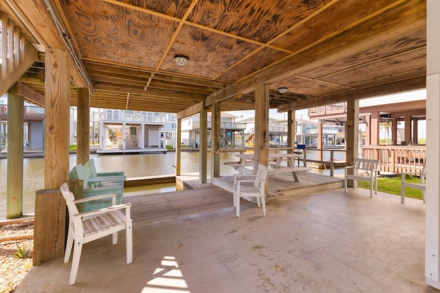 16711 Kingston Way, Galveston, TX 77554 - view of patio with a water view, boat lift, and a boat dock