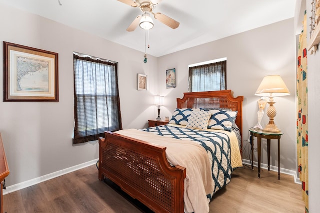 16711 Kingston Way, Galveston, TX 77554 - bedroom with wood finished floors and a ceiling fan