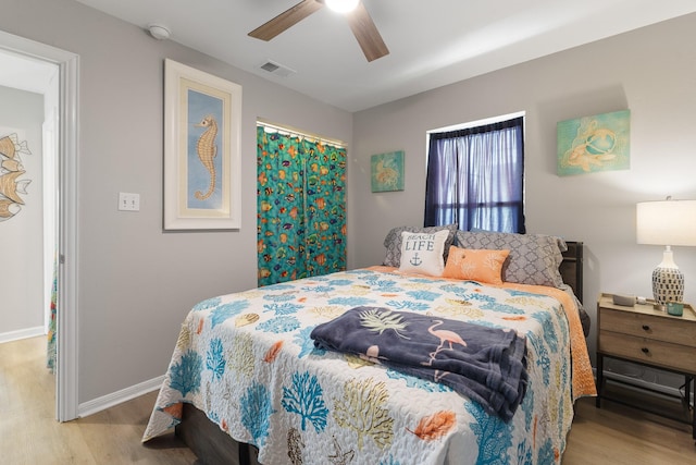 16711 Kingston Way, Galveston, TX 77554 - bedroom with wood finished floors and a ceiling fan