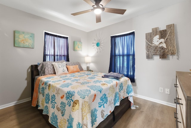 16711 Kingston Way, Galveston, TX 77554 - bedroom with wood finished floors and a ceiling fan