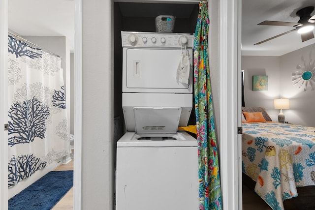 16711 Kingston Way, Galveston, TX 77554 - laundry room with stacked washer / drying machine and ceiling fan