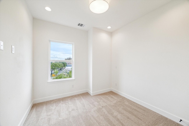 306 Felt Cir, Houston, TX 77011 - carpeted spare room featuring recessed lighting