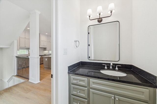 306 Felt Cir, Houston, TX 77011 - bathroom with wood finished floors and vanity