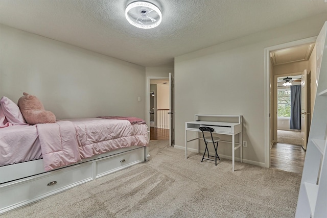 22811 Northampton Pines Dr, Spring, TX 77389 - carpeted bedroom with a textured ceiling and attic access