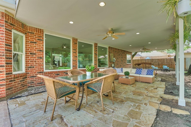 22811 Northampton Pines Dr, Spring, TX 77389 - view of patio / terrace featuring ceiling fan, outdoor dining space, and an outdoor living space