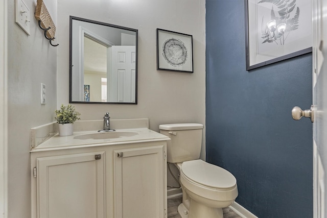 22811 Northampton Pines Dr, Spring, TX 77389 - half bathroom with vanity and wood finished floors