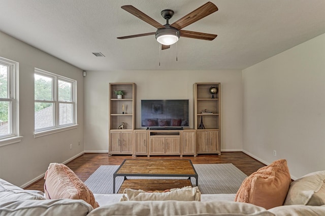 22811 Northampton Pines Dr, Spring, TX 77389 - living area with ceiling fan and dark wood finished floors