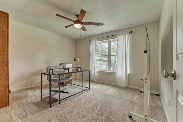 22811 Northampton Pines Dr, Spring, TX 77389 - office featuring a ceiling fan, a textured ceiling, and light carpet