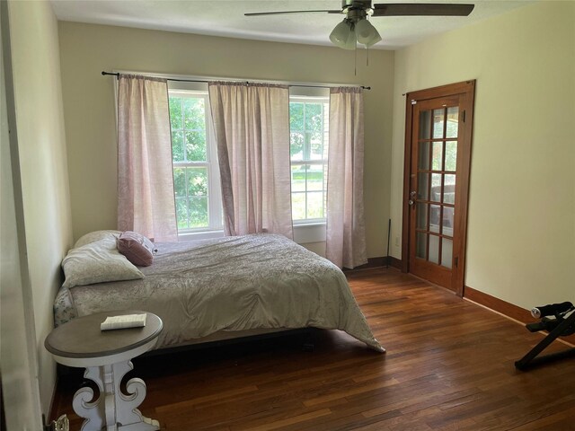 926 S Cass St, Centerville, TX 75833 - bedroom with dark wood-style floors and ceiling fan