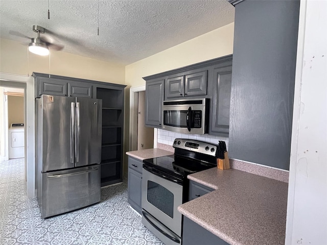 926 S Cass St, Centerville, TX 75833 - kitchen with appliances with stainless steel finishes, washer / clothes dryer, a textured ceiling, tasteful backsplash, and ceiling fan