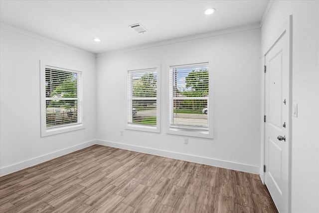 4358 Larkspur St, Houston, TX 77051 - empty room featuring crown molding, wood finished floors, and recessed lighting