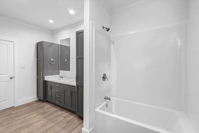 4358 Larkspur St, Houston, TX 77051 - bathroom with wood finished floors, double vanity, bathing tub / shower combination, ornamental molding, and recessed lighting