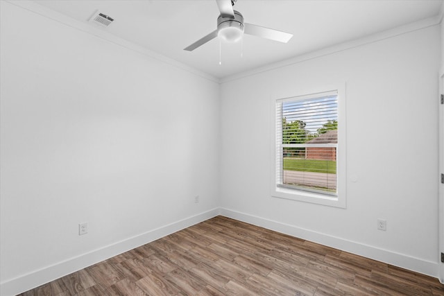4358 Larkspur St, Houston, TX 77051 - spare room with wood finished floors, ceiling fan, and crown molding