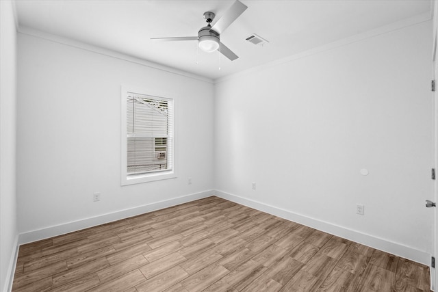 4358 Larkspur St, Houston, TX 77051 - spare room featuring ceiling fan, wood finished floors, and crown molding