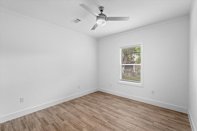 4358 Larkspur St, Houston, TX 77051 - empty room with ornamental molding, light wood-style flooring, and ceiling fan