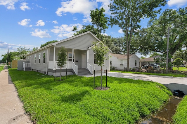 4358 Larkspur St, Houston, TX 77051 - view of front of house with covered porch, a front yard, and driveway