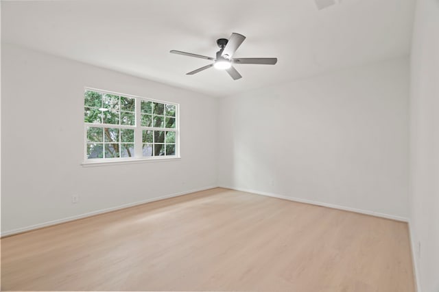 8215 Twining Oaks Ln, Spring, TX 77379 - unfurnished room with light wood-type flooring and ceiling fan
