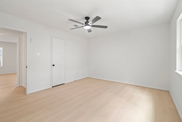 8215 Twining Oaks Ln, Spring, TX 77379 - spare room with light wood-style flooring and a ceiling fan