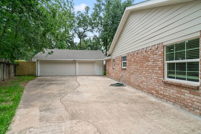 8215 Twining Oaks Ln, Spring, TX 77379 - garage with driveway