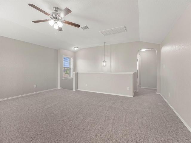419 Eastern Phoebe, San Antonio, TX 78253 - empty room with arched walkways, ceiling fan, lofted ceiling, and carpet