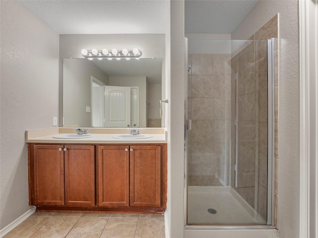 419 Eastern Phoebe, San Antonio, TX 78253 - full bathroom with a shower stall, double vanity, and a textured wall