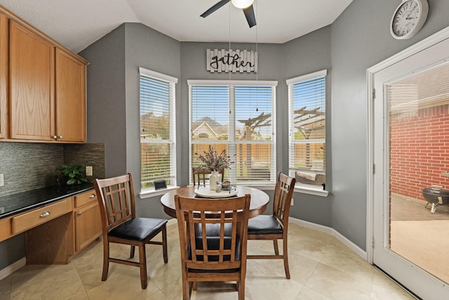 18114 Rustic Springs Dr, Tomball, TX 77375 - dining area with ceiling fan and light tile patterned floors