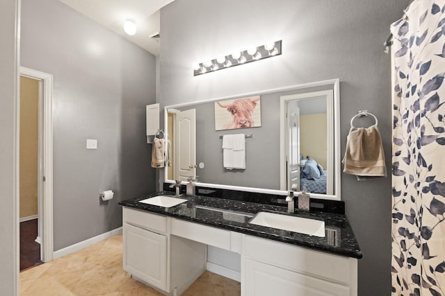 18114 Rustic Springs Dr, Tomball, TX 77375 - full bath featuring double vanity and tile patterned flooring