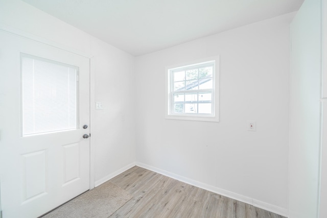 8318 Hanfro Ln, Houston, TX 77088 - spare room with light wood-style floors and baseboards