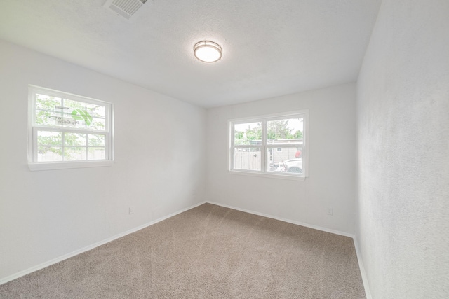 8318 Hanfro Ln, Houston, TX 77088 - carpeted spare room with baseboards