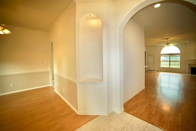 14811 Horse Creek Ln, Sugar Land, TX 77498 - corridor with arched walkways and wood finished floors