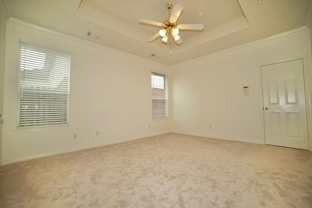 14811 Horse Creek Ln, Sugar Land, TX 77498 - unfurnished room featuring a tray ceiling, carpet, a ceiling fan, and crown molding