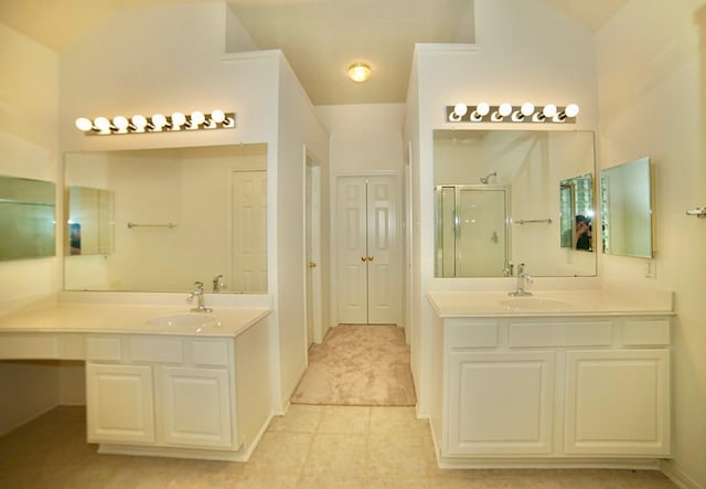 14811 Horse Creek Ln, Sugar Land, TX 77498 - full bathroom with a shower stall, two vanities, tile patterned flooring, and lofted ceiling